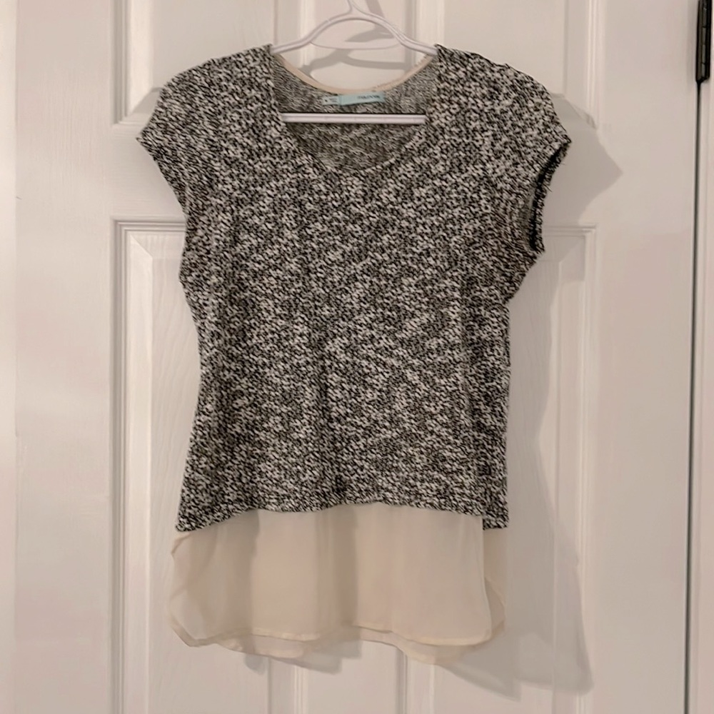 Maurices black and white knit shirt with silk bottom. Size M